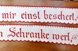 Schrankbordüren mit Sinnspruch um 1900